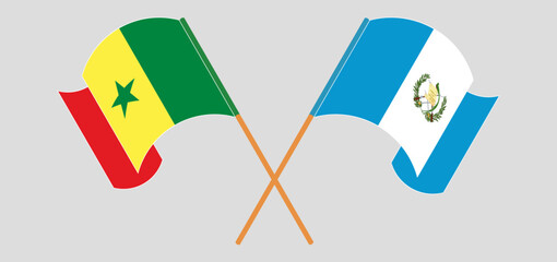 Wall Mural - Crossed and waving flags of Senegal and Republic of Guatemala