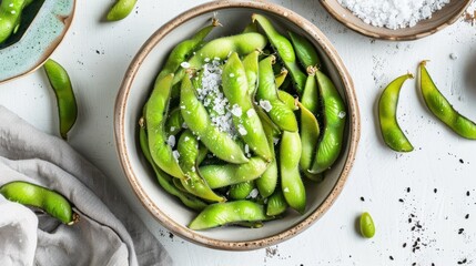 Wall Mural - A bowl of green beans with salt and pepper sprinkled on top