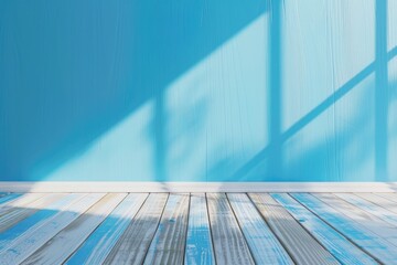 Wall Mural - A blue room with a wooden floor and a window. The room is empty and has a light blue color