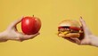 © Stefan - Close-up of Hands Holding Apple and Hamburger Against Yellow Background, Food and Health Concept Generative AI