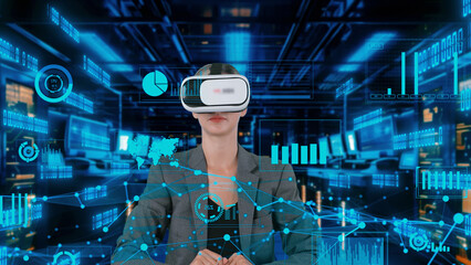 Wall Mural - Businesswoman pointing world market data rotating analysis screen by VR future global innovation interface digital infographic network technology virtual hologram global animation server. Contraption.