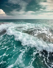 Abstraction of sea foam in the ocean. Turquoise light water.