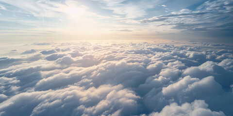 Wall Mural - Beautiful view from the airplane window flying above the clouds blue sky in sunny day and soft sunlight in the afternoon. 