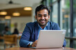 © BARETH - Young Indian Man in Suit Working on Laptop
