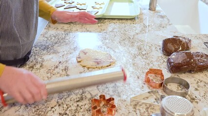 Poster - Baking Christmas Gingerbread Cookies in Modern White Kitchen