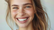 © Julia Zarubina - beautiful young smiling woman with white and straight teeth, portrait, face, mouth, background, space for text, style, model, girl, lady, beauty, skin, dental care, European person, people, expression