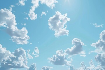 Wall Mural - a small plane flies through a clear blue sky with scattered clouds, offering breathtaking views