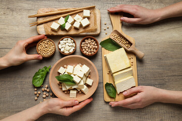 Wall Mural - Tofu in a wooden bowl with beans and soy on a wooden background