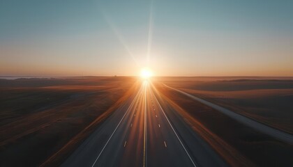 sunrise over a long straight highway