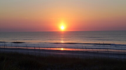 Sticker - Watching the sunrise over the ocean is a magical start to any beach day