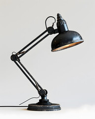 Wall Mural - Vintage black desk lamp isolated on white background
