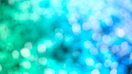 Wall Mural - Colorful glowing lights blur bokeh abstract background Glittering aesthetic textured pattern