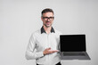 © be free - Business success. CEO manager businessman isolated on grey. Video conferencing. Successful business man using laptop. Businessman work online. Online marketing manager. Copy space