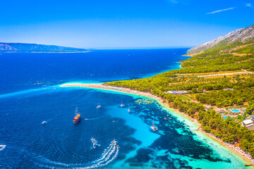 Wall Mural - view of the sea in Bol town, Zlatni Rat beach, symbol of the Adriatic Sea