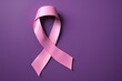 © Ayahe Stock - A pink ribbon on a purple background