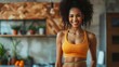© Generative AI - Portrait of cheerful young African American lady in sportswear measuring waist with tape feeling happy about losing weight at home Healthy lifestyle sports and slimming diet concept : Generative AI