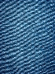 Sticker - Close up of blue denim fabric with a detailed weave.