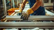 © ShStock - PVC industry worker making PVC frames for windows and doors
