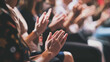 © VK Studio - An attentive audience claps energetically during an engaging presentation, showcasing appreciation and focus.