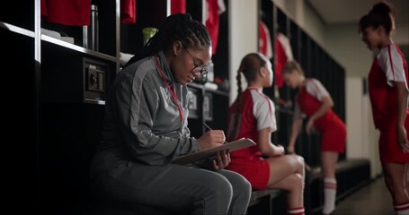 Sticker - Woman, soccer and coach with clipboard in locker room for game plan, strategy or team formation. Young female person, mentor or football trainer writing rules, gameplay or ideas before start of match