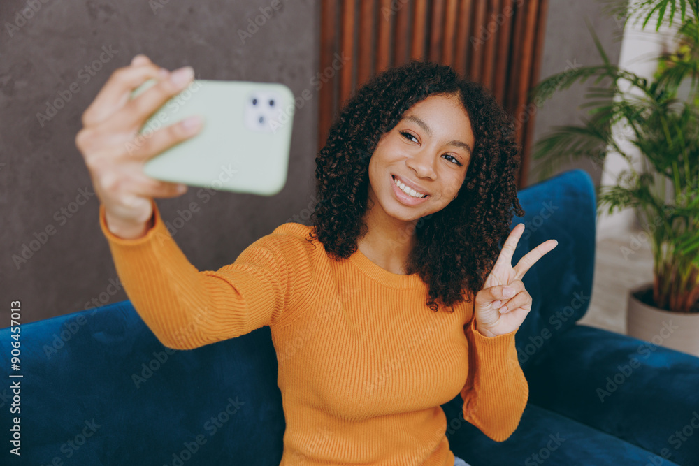 Little happy kid teen girl wear casual clothes doing selfie shot on ...