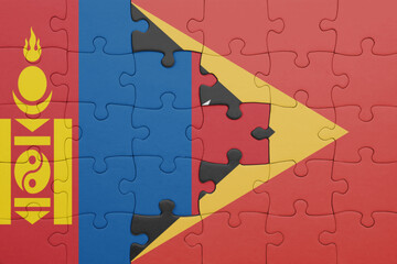 puzzle with the colourful national flag of mongolia and flag of east timor .