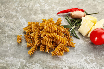 Poster - Raw whole grain pasta fusilli