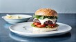 © Photo zone - Photo of a burger, on a plate, a fatty piece of meat, a bun, processed cheese, tomato, onion, sauce, greens, on a table decorated with herbs