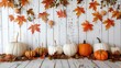 © KumCup - A rustic autumn display with pumpkins, colorful leaves, and wooden background, creating a cozy fall atmosphere.