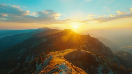 Wall Mural - A mountain range with a sunset in the background.