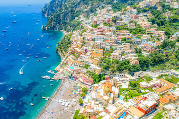 Wall Mural - Positano town, beach and beautiful colorful houses on the cliff in Amalfi coast in Italy