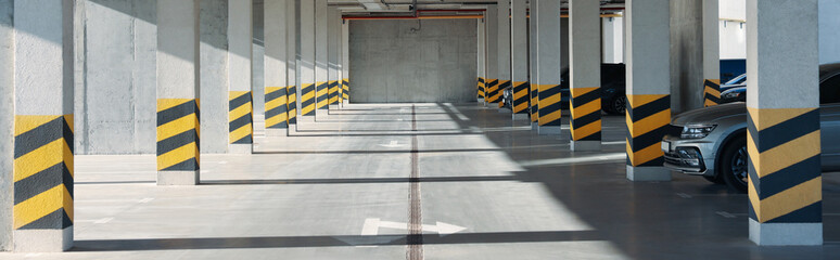 Wall Mural - Open parking garage with cars on sunny day, banner design