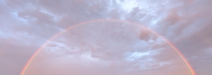 Rainbow With Clouds