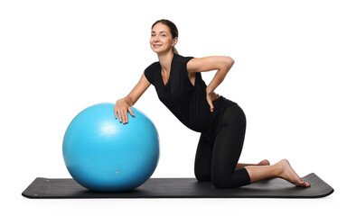 Canvas Print - Beautiful pregnant woman with fitball doing exercises on mat against white background