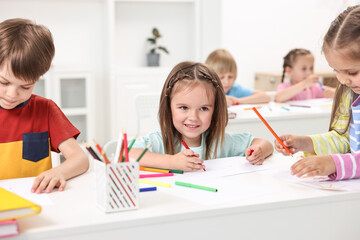 Sticker - Group of children drawing at table indoors