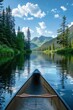 © Sunshine - Scenic Canoe Ride on a Serene Mountain Lake with Lush Greenery and Clear Blue Sky