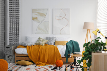 Sticker - Teen's room interior with modern furniture and beautiful pictures on wall