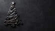 © Maria Mikhaylichenko - Creative Christmas tree made of various metal tools and wrenches on dark background, topped with silver star, symbolizing mechanic's holiday spirit.