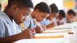 © Meritxell Cid - A group of children are sitting at desks and writing