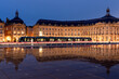 © robertharding - Tram at the Miroir D'Eau, Place de la Bourse at blue hour, Bordeaux, Gironde, Aquitaine, France, Europe