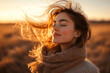 © Ikram - Backlit Portrait of calm happy smiling free woman with closed eyes enjoys a beautiful moment life on the fields at sunset