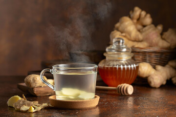 Wall Mural - Ginger tea on a brown background.