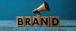 © ibnu - Brand building and brand awareness concept with megaphone on wooden cubes