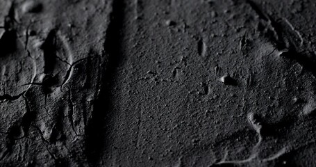 Wall Mural - Rough rocky darkness. Dark crumpled texture surface. Used as a background and texture.