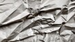 © fotoworld - Crumpled paper texture, symbolizing recycling issues and environmental conservation, ideal for Earth Day concepts