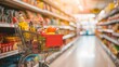 © AlfaSmart - Shopping cart filled with groceries in a brightly lit supermarket aisle