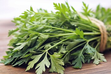 Wall Mural - Bunch of fresh parsley on a wooden surface