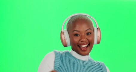 Sticker - Black woman, studio and dancing with headphones in green screen for music, fun and entertainment. Female person, studio and happy or smile with audio sound, radio and song with online streaming