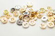 © Q77photo - A pile of buttons of various shapes and sizes