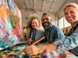 © Nadya - Happy multiracial artists collaborating on a colorful artwork